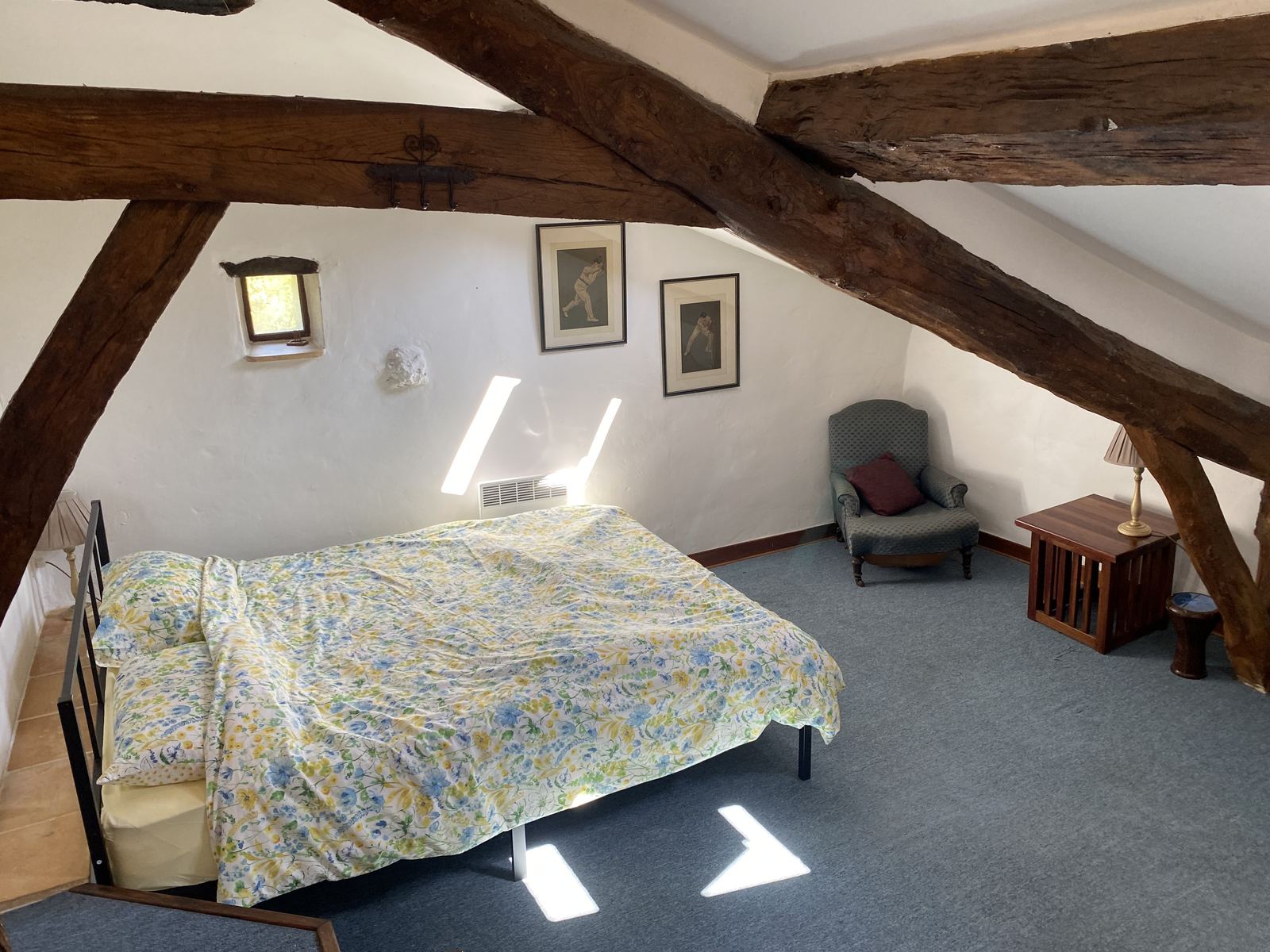 Bedroom Four with exposed beams at Mongaudon