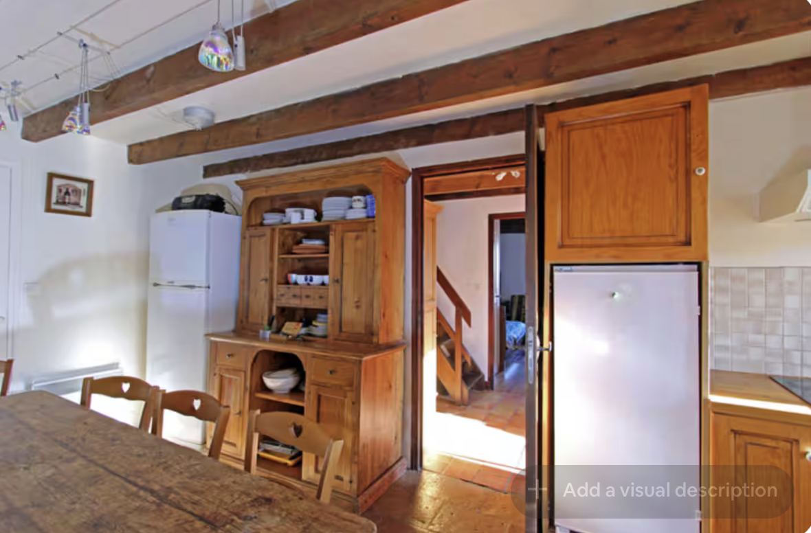 Kitchen at Mongaudon with beamed ceiling
